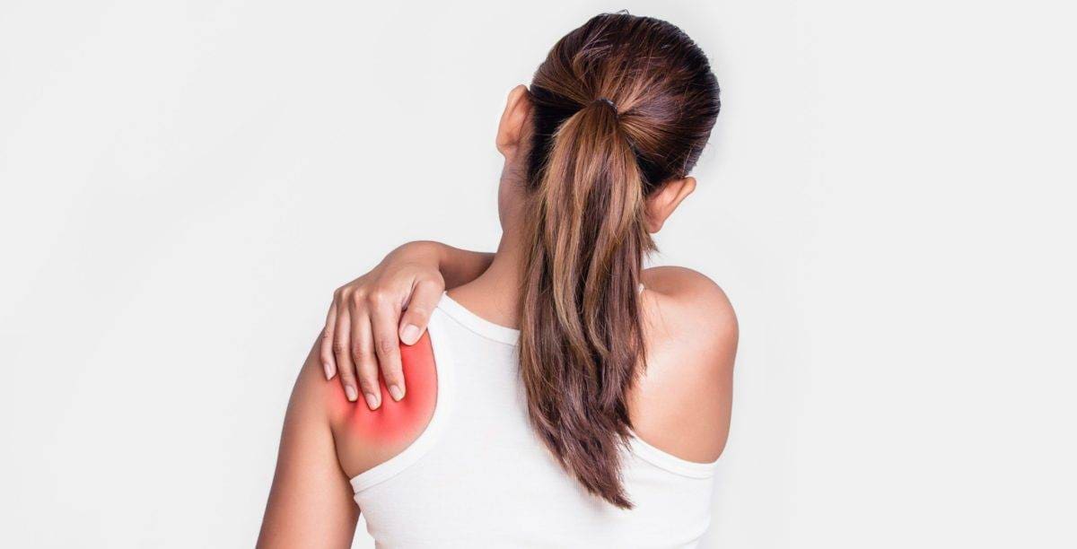Asian woman with shoulder pain
